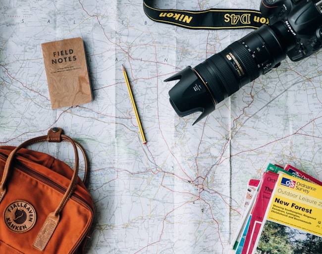 Traveler looking at a map and planning a trip
